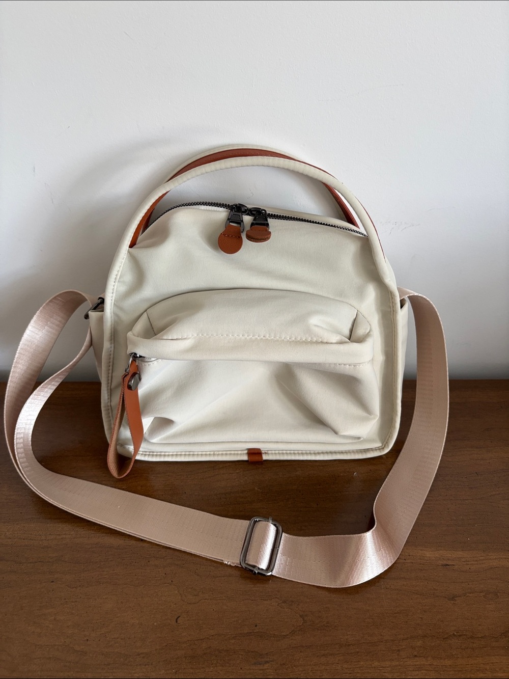 Cream Crossbody Mini Backpack with Tan Accents